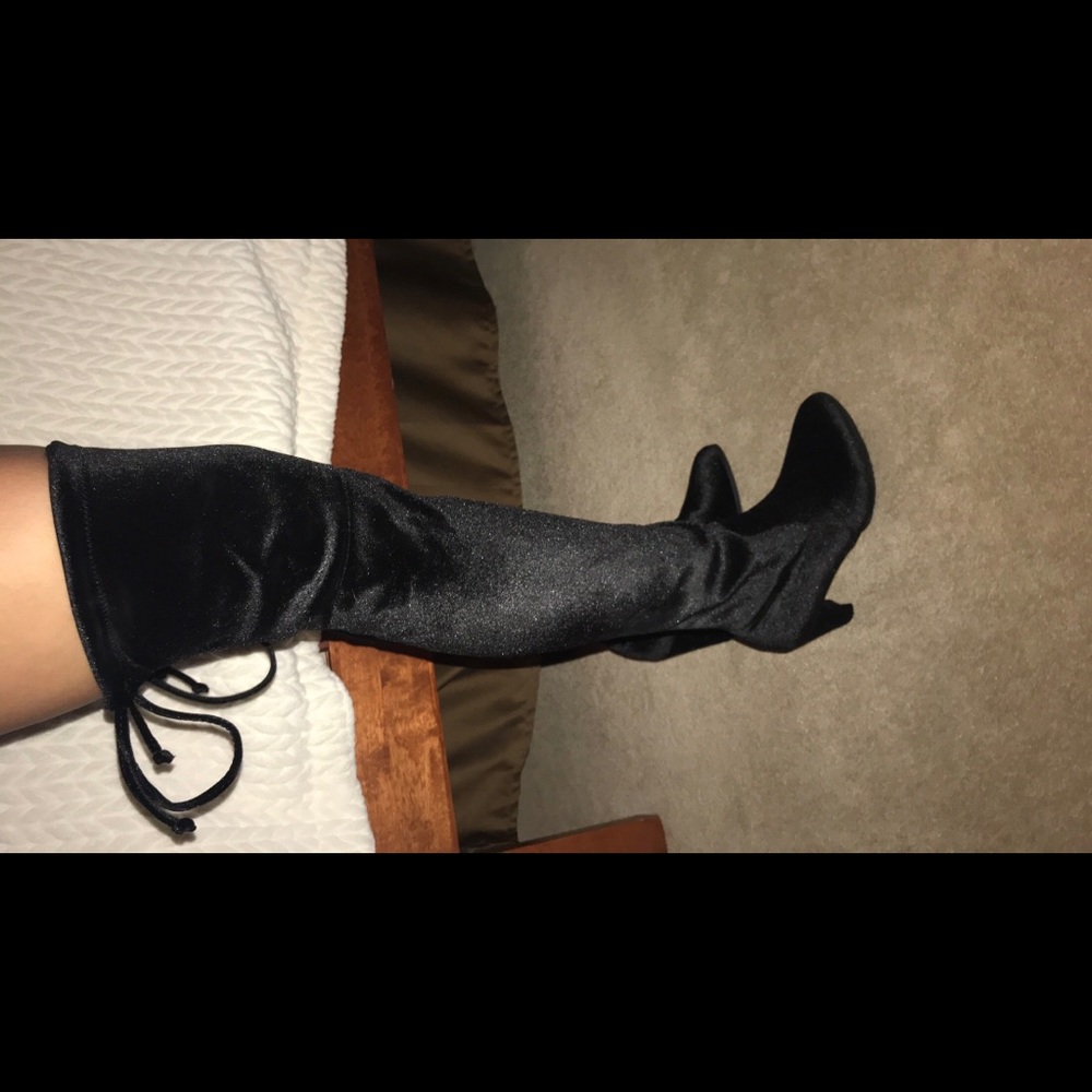 Never worn black knee high boots